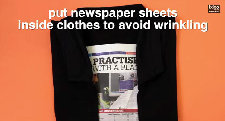 Put newspaper sheets inside clothes to avoid wrinkling